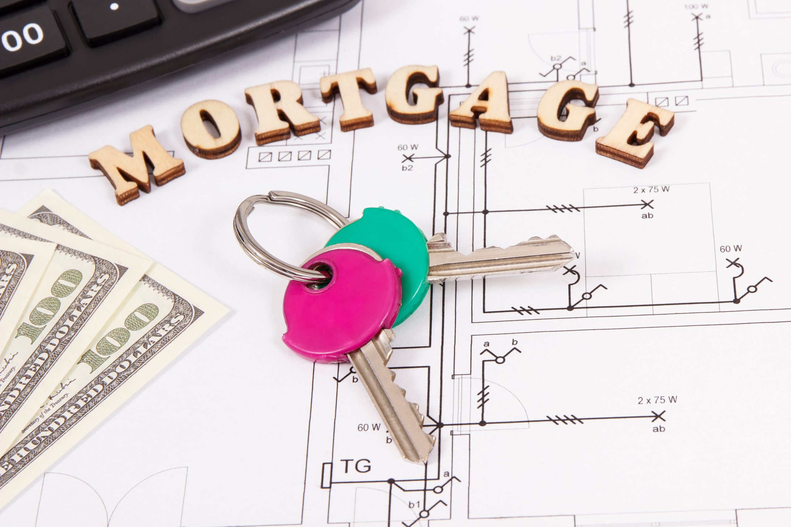 inscription mortgage keys money and calculator on ZHYJKBU min scaled